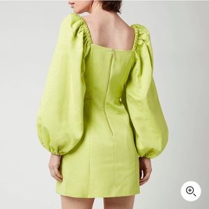 Ted Baker dress with exaggerated puff sleeves and pockets. Color is lime green.